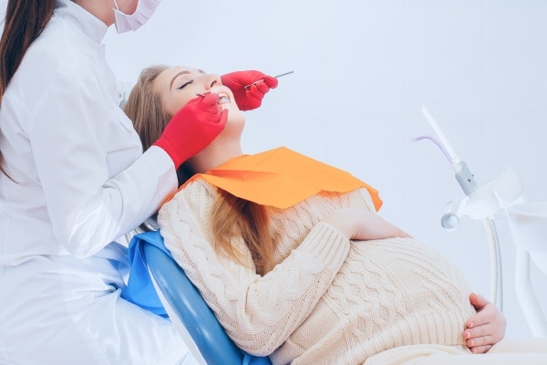 Лечение зубов беременным
